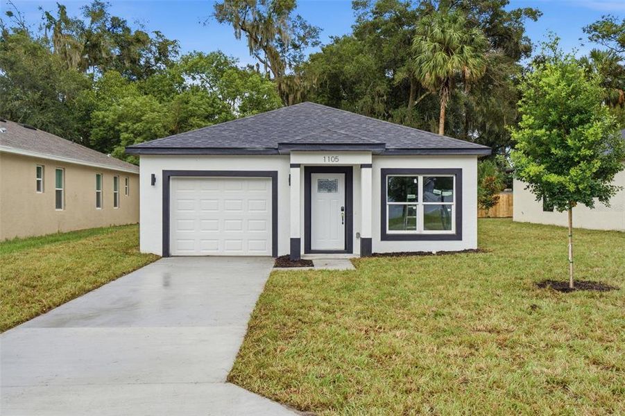 Front exterior of a new home in , Deland, FL, highlighting curb appeal (Image 18).