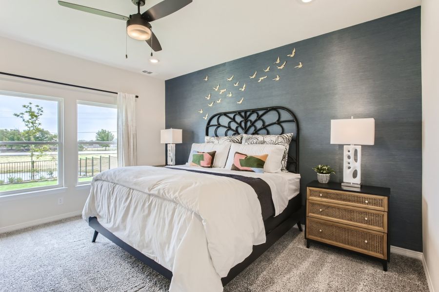 A bedroom with a large bed.