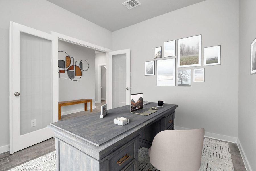 Home office with glass french doors. Sample photo of completed home with similar floor plan. As-built interior colors and selections may vary. Home office with glass french doors. Sample photo of completed home with similar floor plan. As-built interior colors and selections may vary.