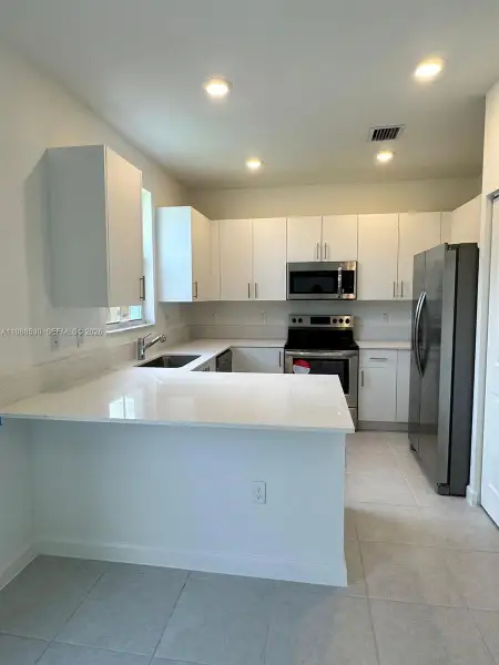 Furnished interior view inside a new home in , Coral Springs (Image 6). Furnished interior view inside a new home in , Coral Springs (Image 6).