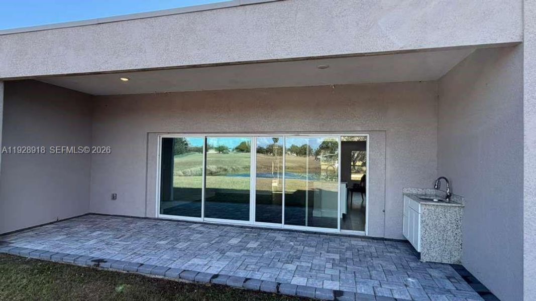 Exterior details and patio area of a home in , Sebring (Image 29).