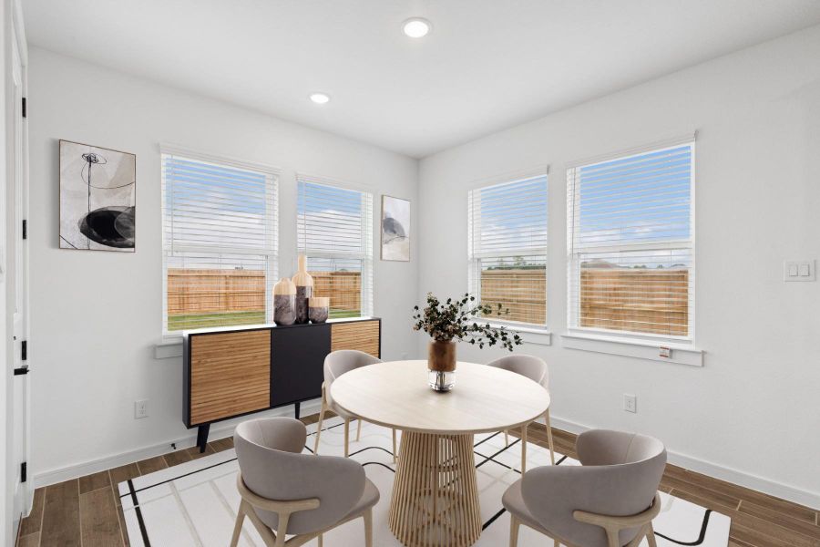 Sun-lit dining area (*Photo not of actual home and used for illustration purposes only.)