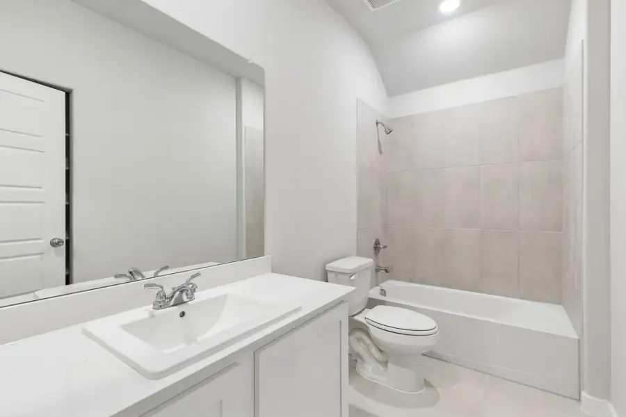 Bathroom in the Oscar home plan by Trophy Signature Homes – REPRESENTATIVE PHOTO Bathroom in the Oscar home plan by Trophy Signature Homes – REPRESENTATIVE PHOTO