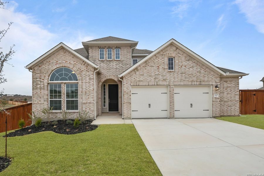 Front exterior of a new home in Homestead, Schertz, TX, highlighting curb appeal (Image 23).