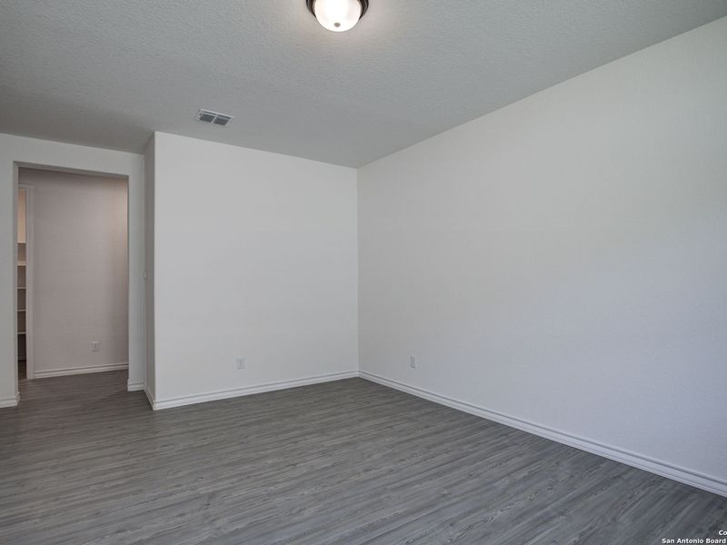 Spacious, unfurnished interior of a new home in The Reserve at Potranco Oaks, Castroville (Image 33).