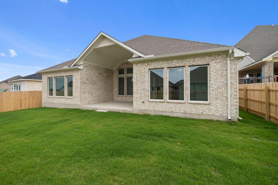 Rear of Home and Private Backyard