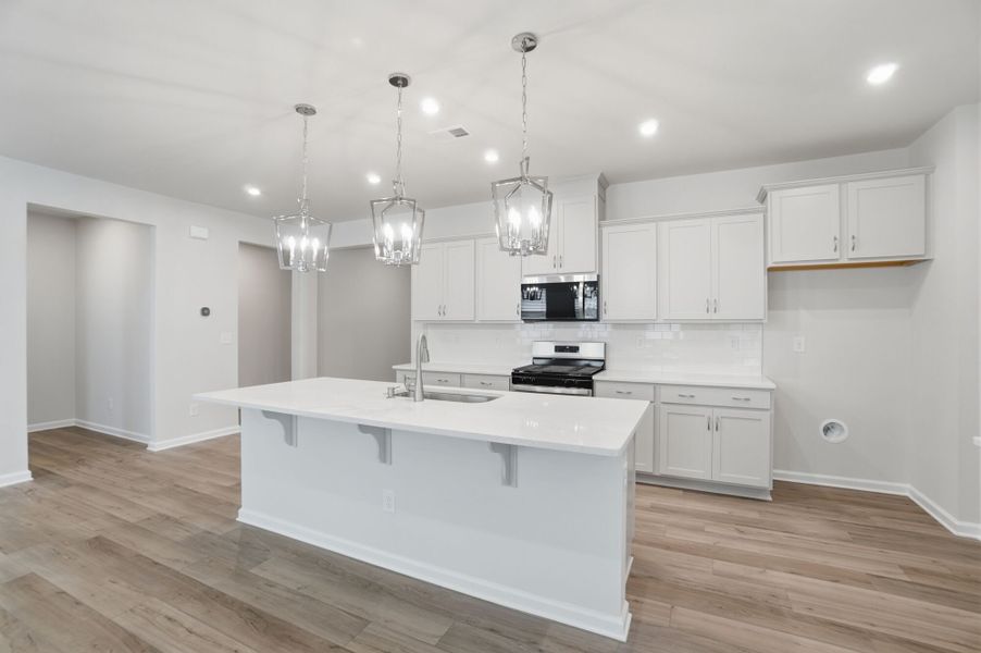 Furnished interior view inside a new home in Waxhaw Landing, Monroe (Image 6).