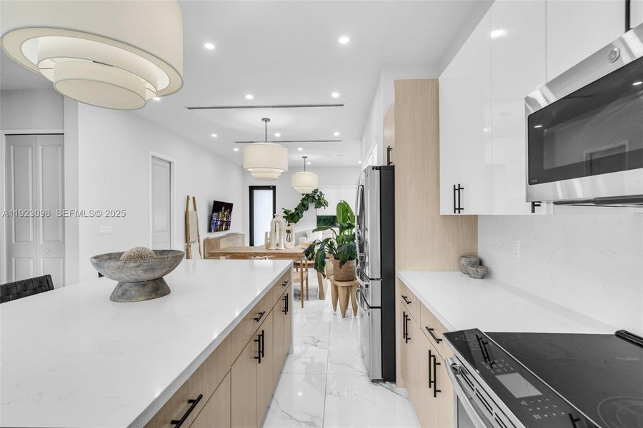 Furnished interior view inside a new home in , Hialeah (Image 12).