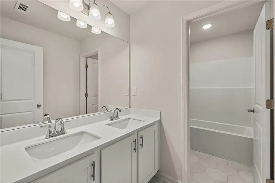 Furnished interior view inside a new home in Lake Carlton, Loganville (Image 9).
