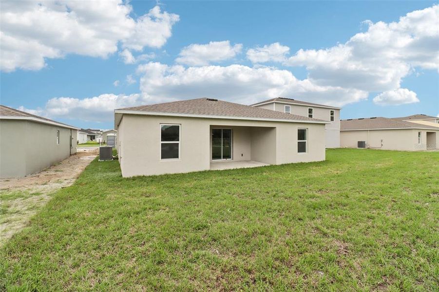 Exterior details and patio area of a home in Sumter Villas, Sumterville (Image 4).