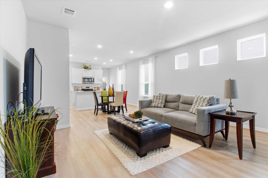 Living room with dining area beyond