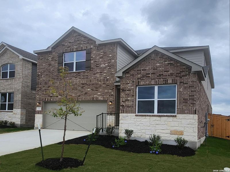 Front exterior of a new home in Arcadia Ridge, San Antonio, TX, highlighting curb appeal (Image 1). Front exterior of a new home in Arcadia Ridge, San Antonio, TX, highlighting curb appeal (Image 1).
