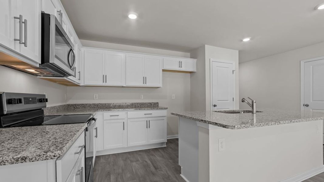 Furnished interior view inside a new home in Aspen Place, Thomasville (Image 7).