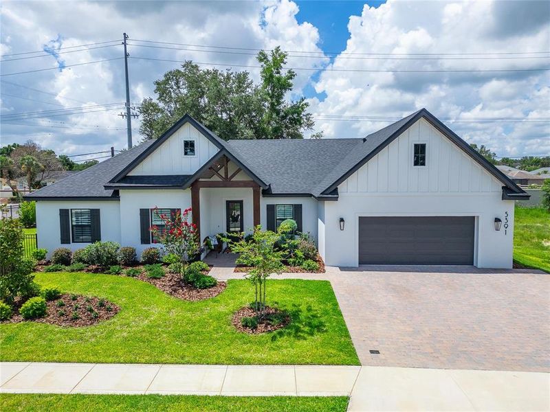 Front exterior of a new home in , Lakeland, FL, highlighting curb appeal (Image 29). Front exterior of a new home in , Lakeland, FL, highlighting curb appeal (Image 29).