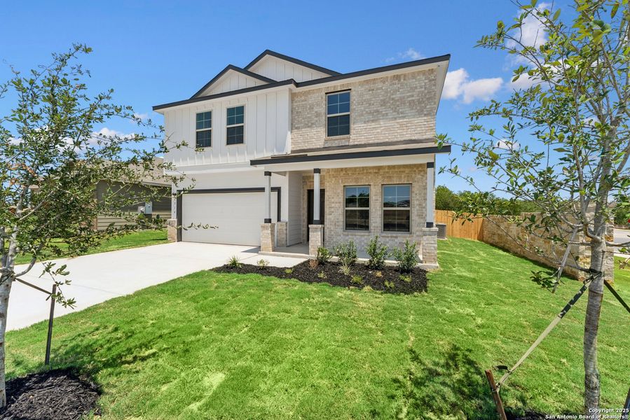 Front exterior of a new home in Cinco Lakes, San Antonio, TX, highlighting curb appeal (Image 11). Front exterior of a new home in Cinco Lakes, San Antonio, TX, highlighting curb appeal (Image 11).