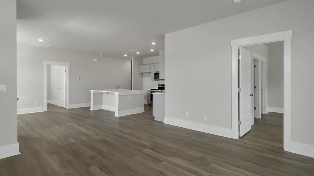 Spacious, unfurnished interior of a new home in The Retreat at Indigo Preserve Townhomes, Leland (Image 15).