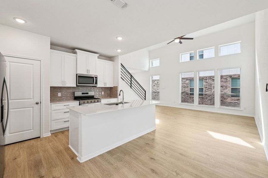 Furnished interior view inside a new home in Crosswinds, Kyle (Image 6).