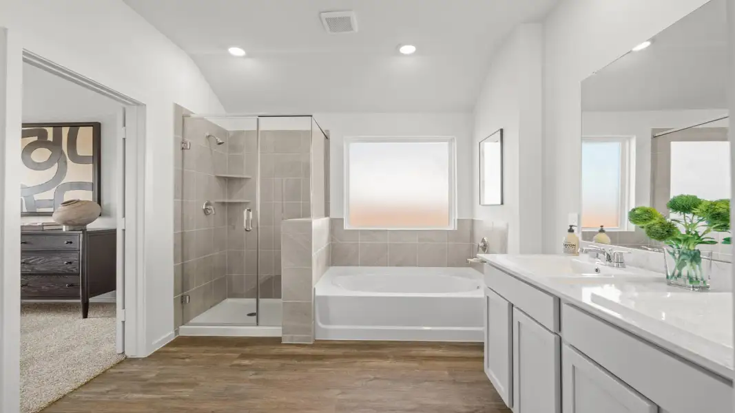Furnished interior view inside a new home in Sunterra Lakes, Brookshire (Image 32).