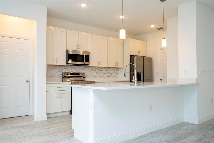 Furnished interior view inside a new home in , Ocala (Image 7).