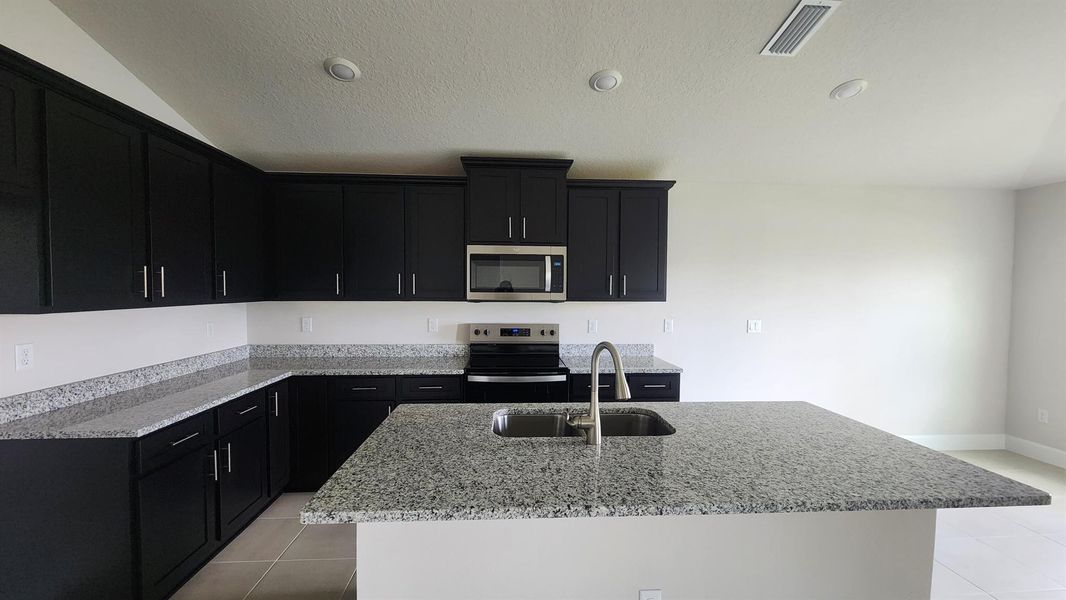 Furnished interior view inside a new home in , Fort Pierce (Image 9).
