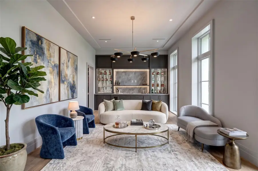 Same room but this photo is virtually staged to show bar/lounge/pub furnishings in lieu of formal dining room. Invite friends and family in for a drink and conversation!