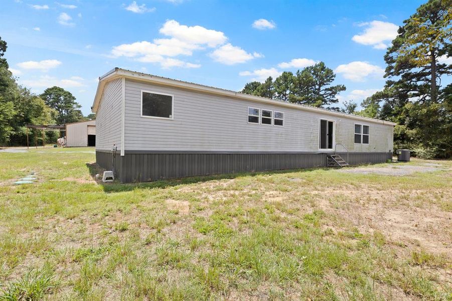 Front exterior of a new home in , Mount Pleasant, TX, highlighting curb appeal (Image 25).