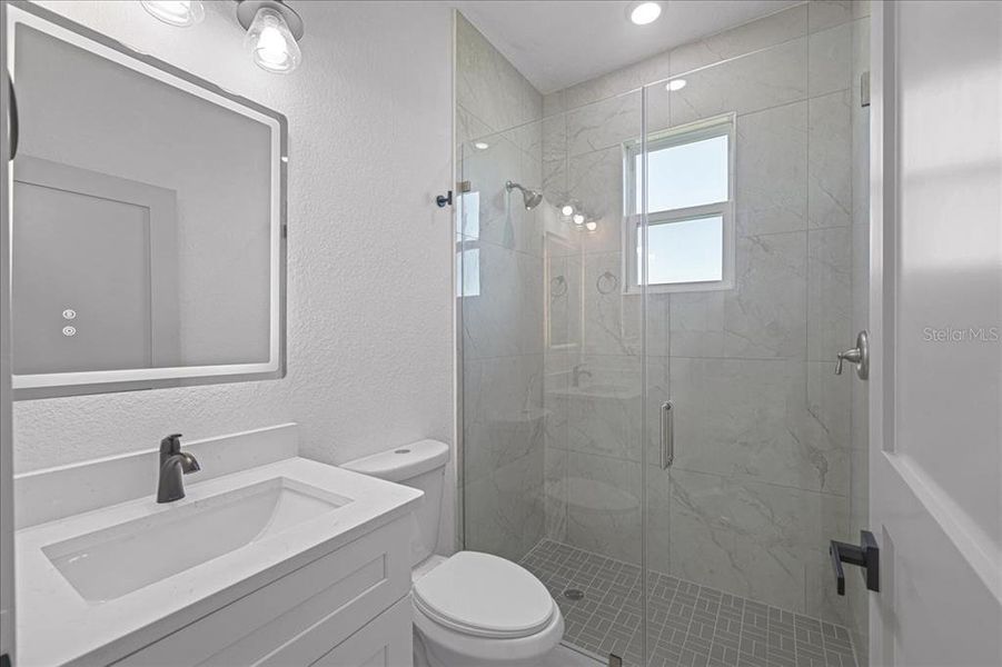 Furnished interior view inside a new home in , Port Charlotte (Image 26).