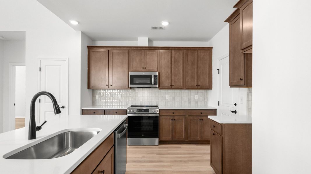 Furnished interior view inside a new home in Indigo at the Preserve, Longs (Image 8).