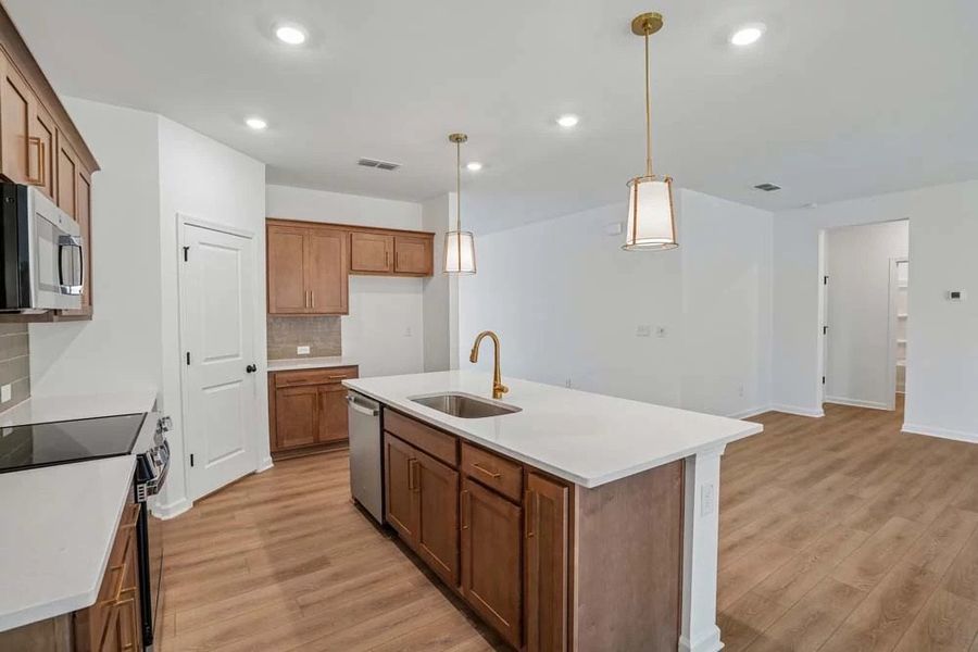 Sample Photo: Kitchen Featuring Laguna Collection Finishes
