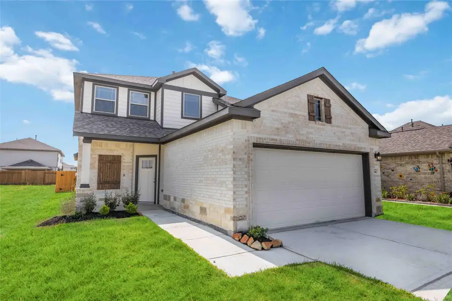 Front exterior of a new home in Bluebonnet Village, Bellville, TX, highlighting curb appeal (Image 1). Front exterior of a new home in Bluebonnet Village, Bellville, TX, highlighting curb appeal (Image 1).