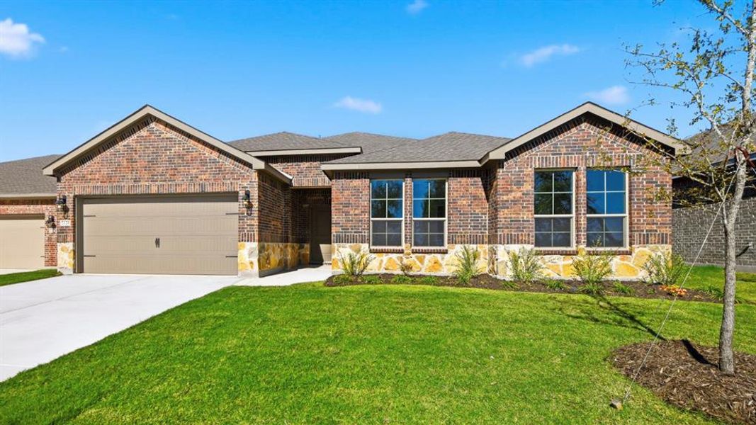 View of front of home featuring brick siding, a front lawn, a garage, driveway, and a shingled roof View of front of home featuring brick siding, a front lawn, a garage, driveway, and a shingled roof