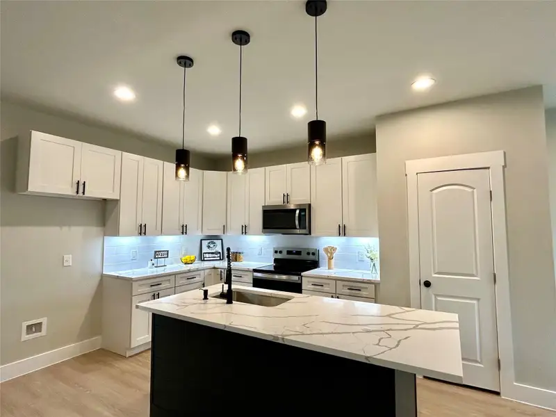 Furnished interior view inside a new home in , Bastrop (Image 5). Furnished interior view inside a new home in , Bastrop (Image 5).