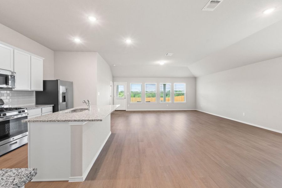 The front foyer opens up completely into this wide-open living space, designed with high ceilings and neutral walls so you can set it up your way The front foyer opens up completely into this wide-open living space, designed with high ceilings and neutral walls so you can set it up your way