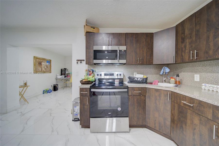 Furnished interior view inside a new home in , Miami (Image 4). Furnished interior view inside a new home in , Miami (Image 4).