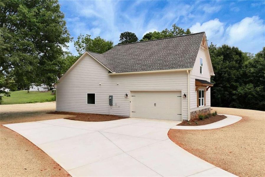 Front exterior of a new home in , Maysville, GA, highlighting curb appeal (Image 20).