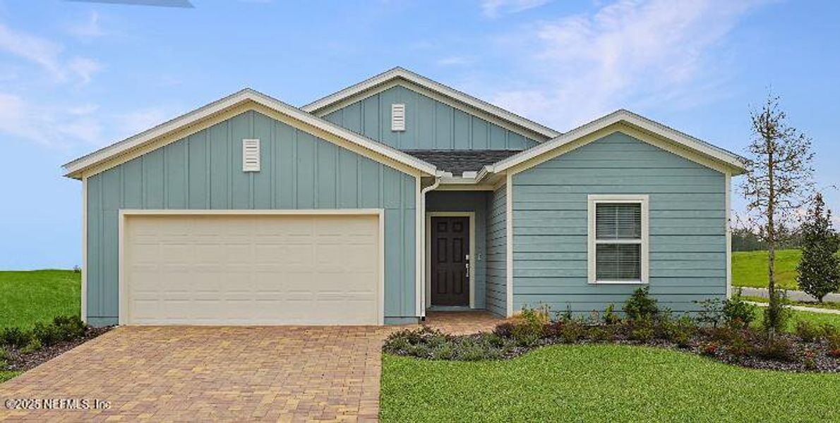 Front exterior of a new home in Saddle Oaks, Jacksonville, FL, highlighting curb appeal (Image 1). Front exterior of a new home in Saddle Oaks, Jacksonville, FL, highlighting curb appeal (Image 1).