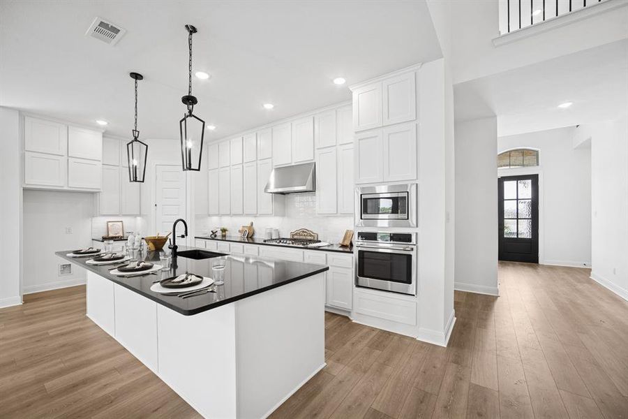 Furnished interior view inside a new home in Terraces – Classics, Rockwall (Image 14). Furnished interior view inside a new home in Terraces – Classics, Rockwall (Image 14).