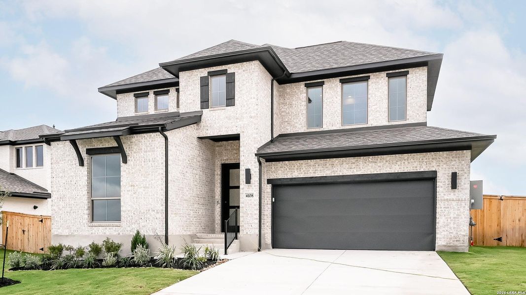 Front exterior of a new home in The Parklands, Schertz, TX, highlighting curb appeal (Image 21).