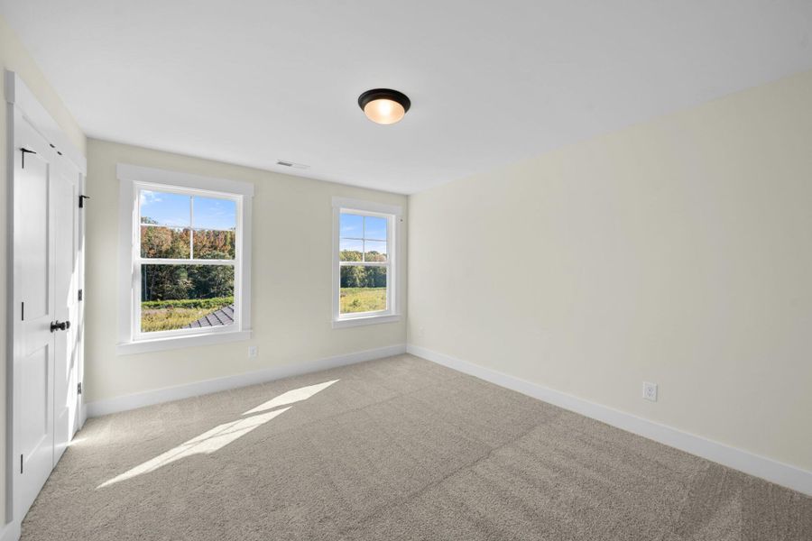 Spacious, unfurnished interior of a new home in Monterra, Kernersville (Image 37).