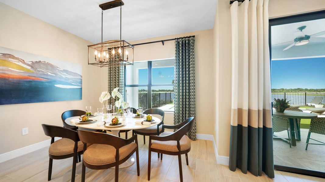 Representative furnished interior of a home built from the Meadow Brook by Neal Communities in SkySail, Naples (Image 10).