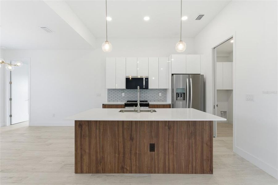 Furnished interior view inside a new home in , Port Charlotte (Image 9).