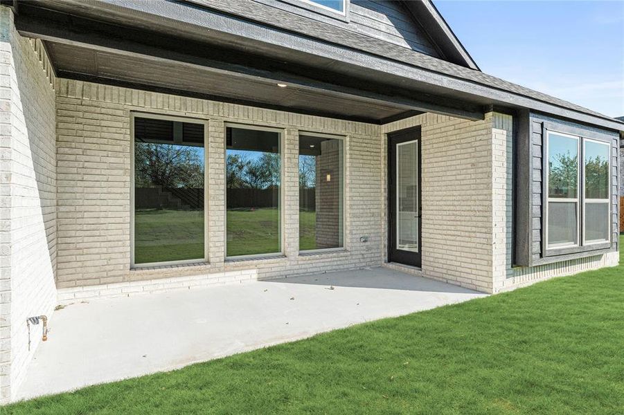 Exterior details and patio area of a home in Crystal Lake Estates, Red Oak (Image 3). Exterior details and patio area of a home in Crystal Lake Estates, Red Oak (Image 3).