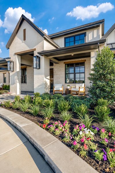 Front exterior of a new home in Hilltop Ranch, Leander, TX, highlighting curb appeal (Image 5).