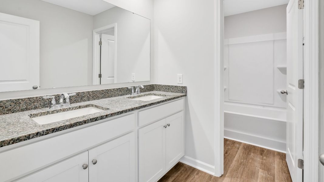 Furnished interior view inside a new home in Saltgrass Landing, Winnabow (Image 12).