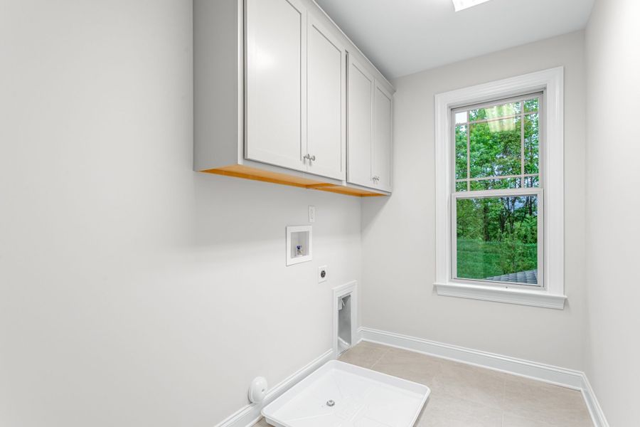 Representative furnished interior of a home built from the Kendall Lux by Keystone Homes NC in Weybridge, Burlington (Image 13).