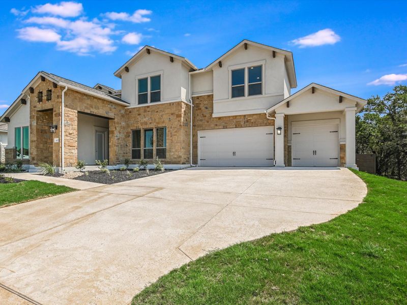 Representative exterior photo of a completed home built from the Topaz II by Giddens Homes in Riverstone, Georgetown, TX (Image 32).