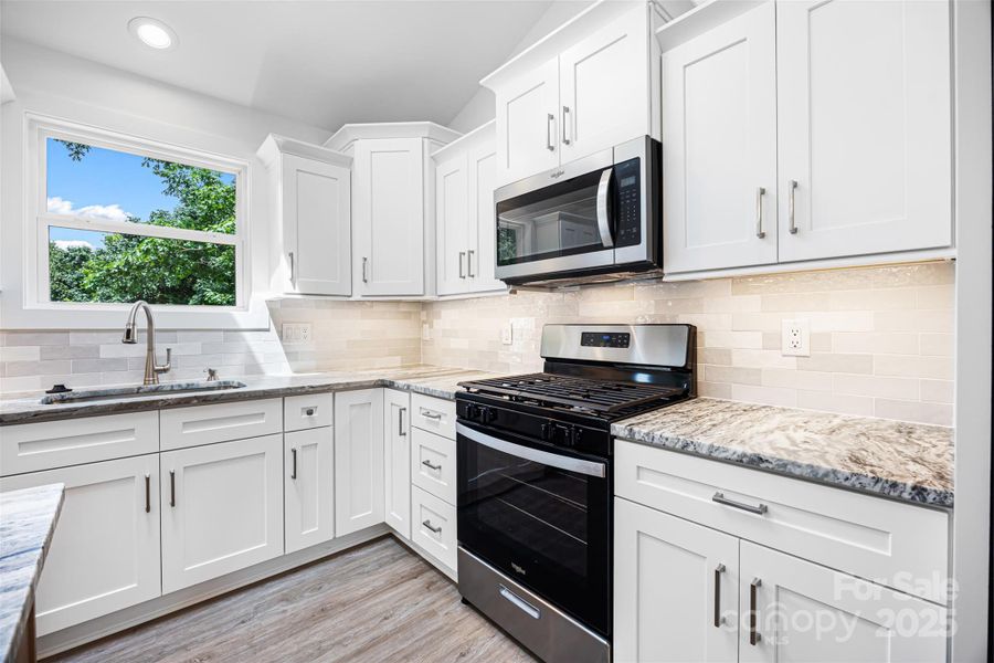 Kitchen with tile backsplash