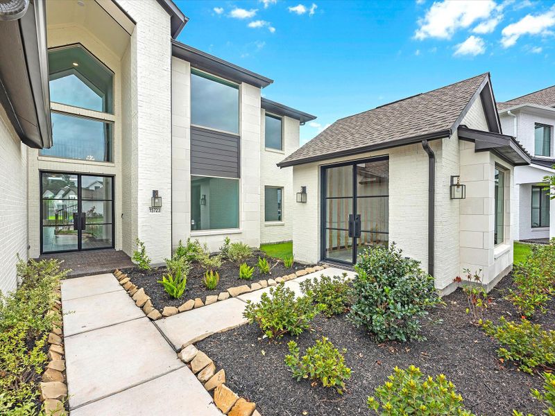 Representative exterior photo of a completed home built from the The Calistoga by Westin Homes in ARTAVIA® - 65' Art Collection, Conroe, TX (Image 15). Representative exterior photo of a completed home built from the The Calistoga by Westin Homes in ARTAVIA® - 65' Art Collection, Conroe, TX (Image 15).