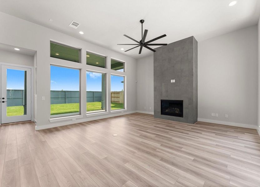 Gas Fireplace, Modern Fan, and LVP Flooring Gas Fireplace, Modern Fan, and LVP Flooring