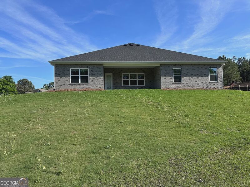 Exterior details and patio area of a home in Oakview Estates, Macon (Image 3).
